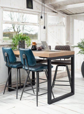 Baker Nixon Rectangular Bar Table features natural reclaimed timber and powder coated anthracite aluminium legs. The table seats 4 people comfortably.