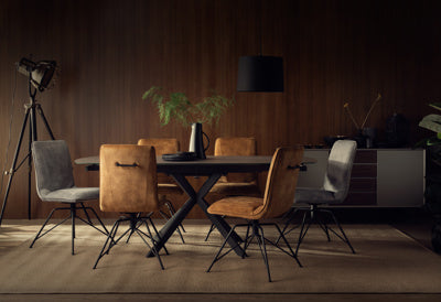 Baker Pair of Lola Dining Chairs upholstered in a grey poly velvet effect fabric, with swivel seat and black powder coated metal legs
