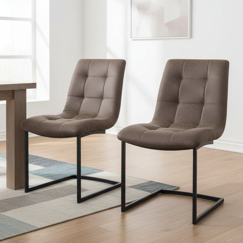 Carlton Furniture Pair of Hampton Chairs in Tan faux leather upholstery with a black cantilever style frame