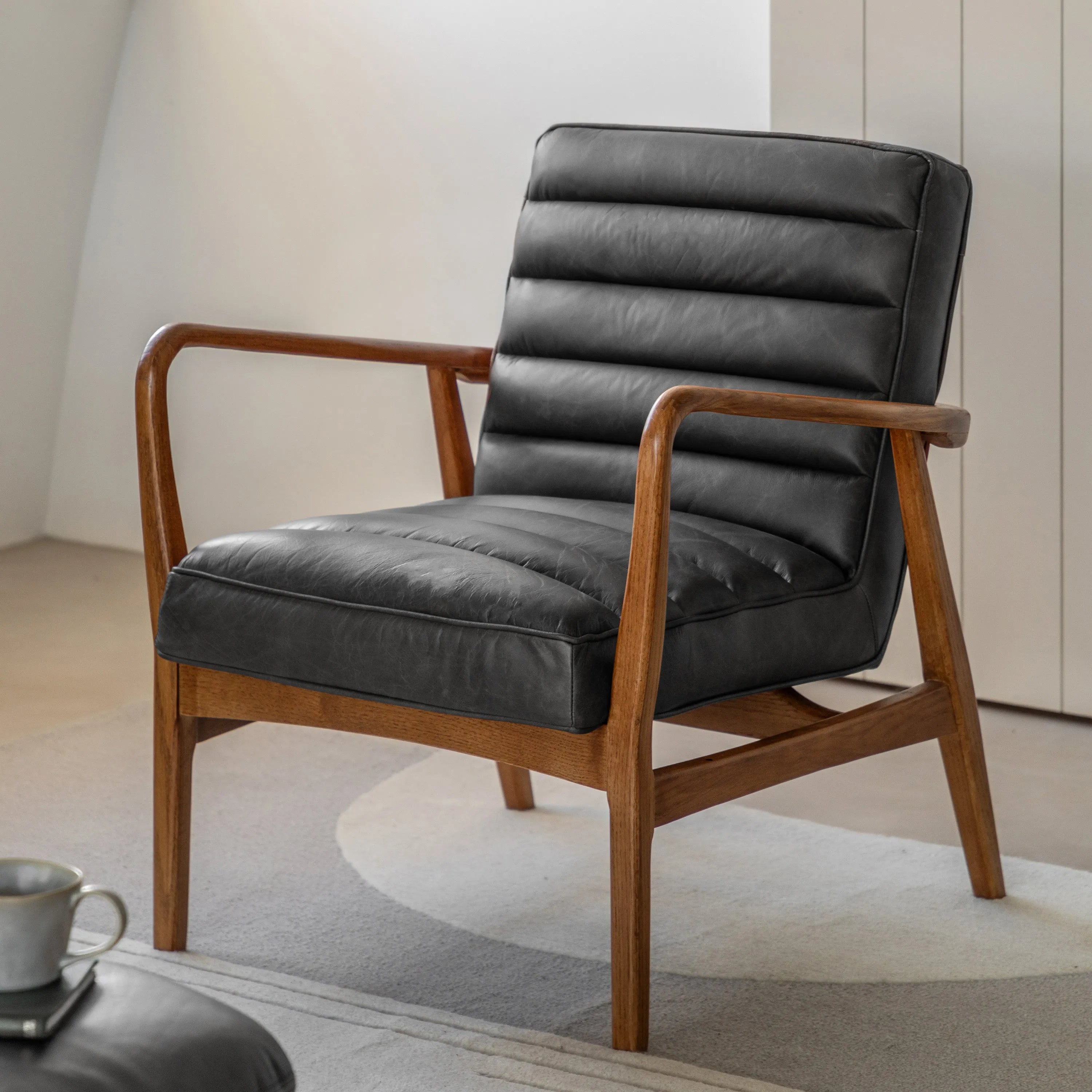 Gallery Direct Datsun Antique Ebony Leather Armchair | Shackletons