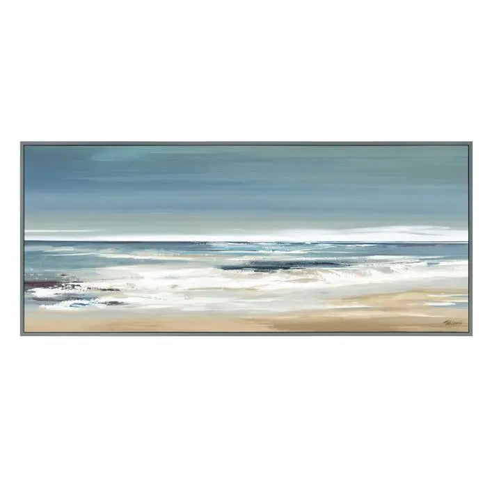 Gallery Direct Along the Coastline Framed Canvas by Valerie Mravyan depicts a striking coastal seascape of crashing waves against the sandy beach in a colour scheme of blues and greens, complemented by a coordinating dark grey wood frame