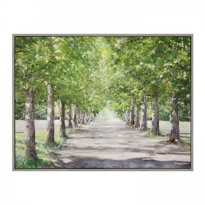 Gallery Direct Avenue of Trees Framed Canvas by artist Anthony Waller is a serene landscape of trees in the morning sunshine with a grey wood effect frame
