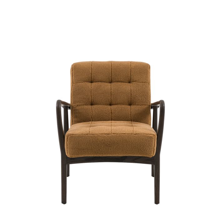 Gallery Direct Humber Armchair is upholstered in a Ochre colour Faux Sheepskin material with a dark ash wood frame