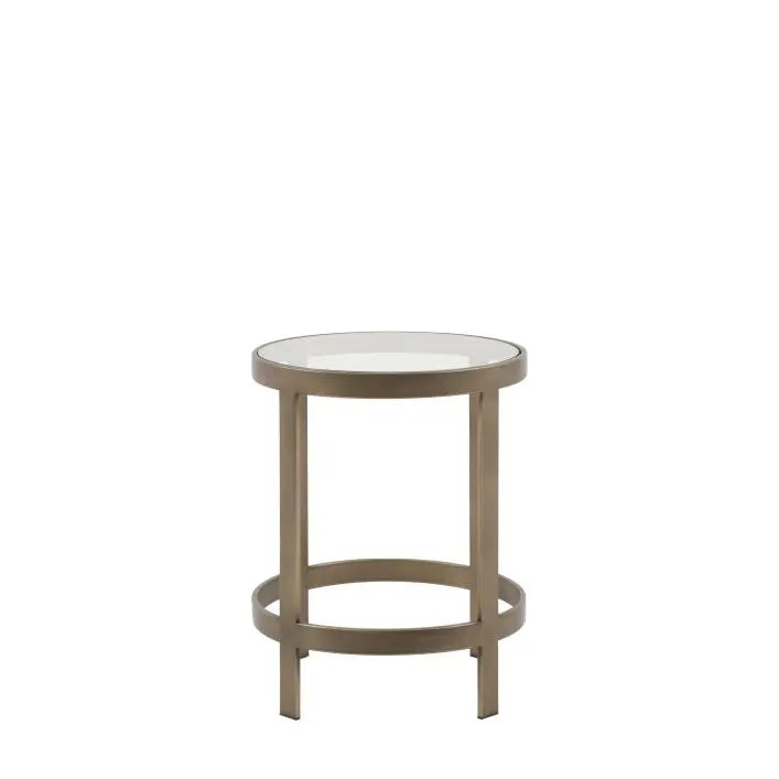 The Gallery Direct Monti Side Table has a round toughened glass table top and a bronze slender frame
