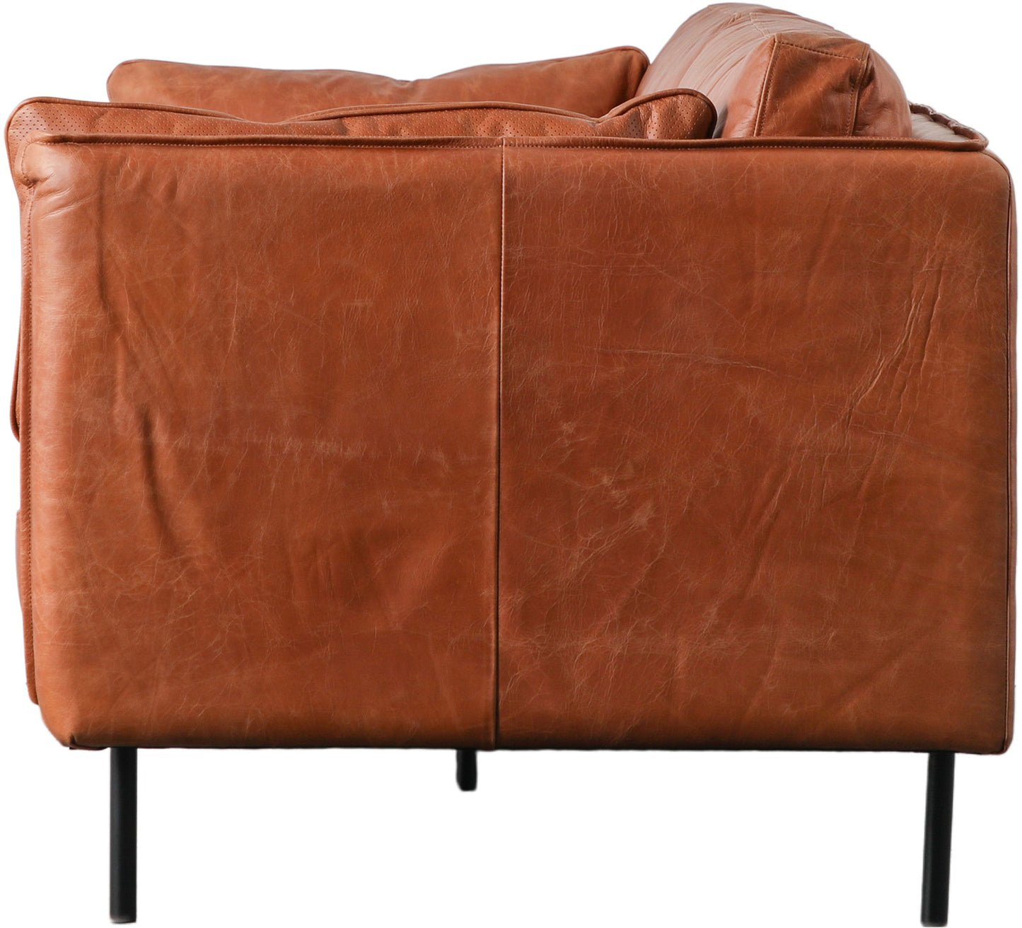 Gallery Direct Wigmore 3 Seater Sofa features a slim frame upholstered in a warm Brown Leather, with sleek black metal legs