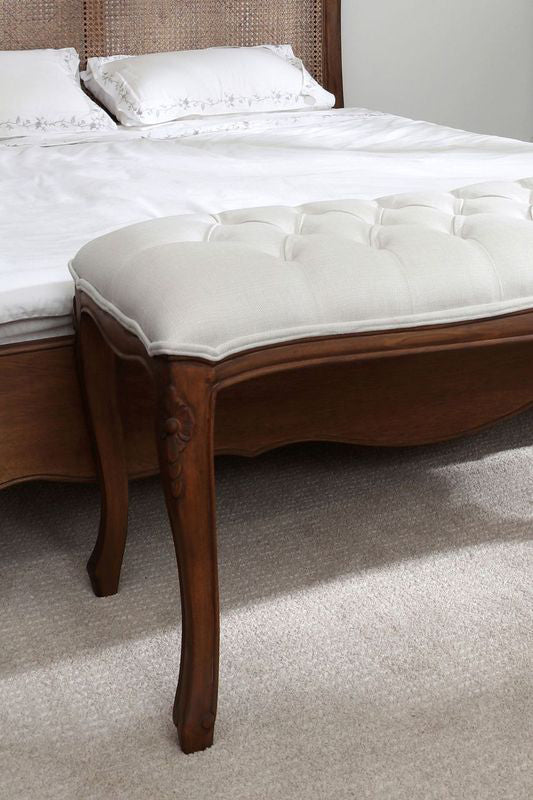 The Laura Ashley bedroom bench from the Montpellier collection features an upholstered seat and walnut French cabriole legs