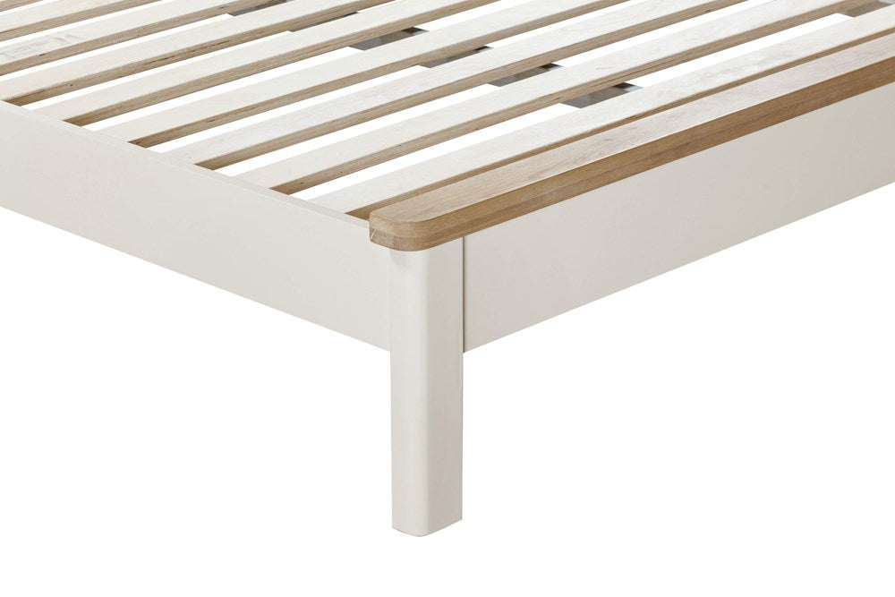 Papaya Foxington 150cm King Size Bed features wooded slats, off white painted frame and natural oak trim to the footboard