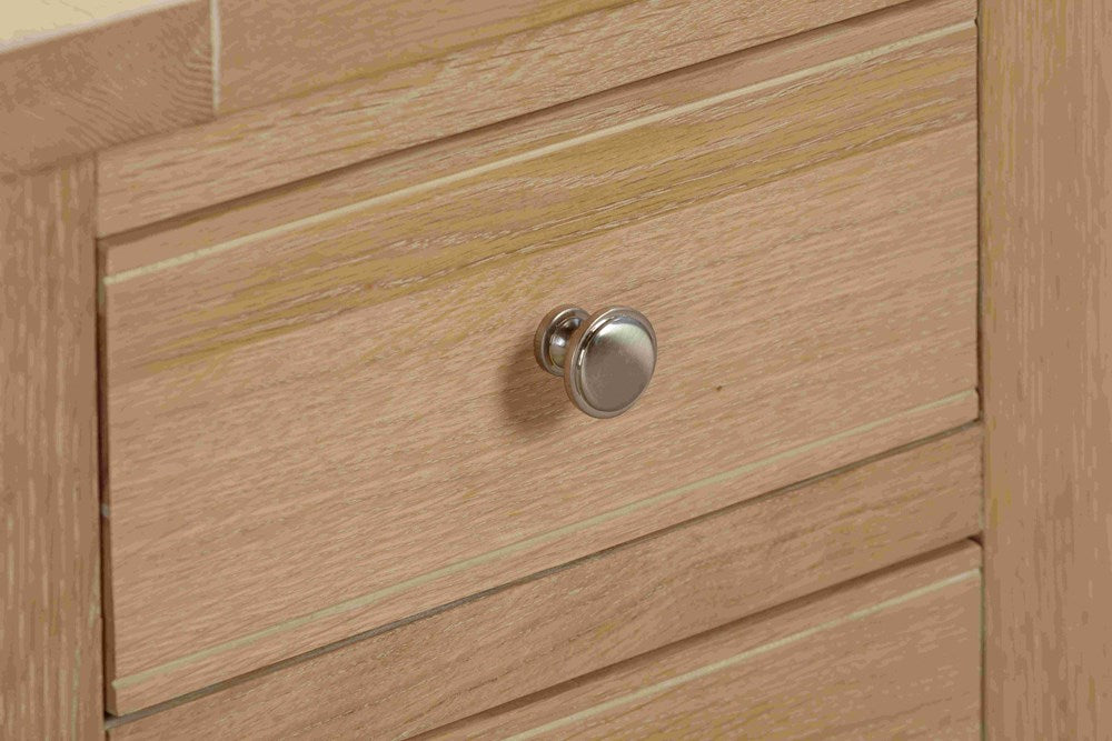 Papaya Foxington Bedside Table in Natural Oak features 3 drawers with stylish metal drawer knobs