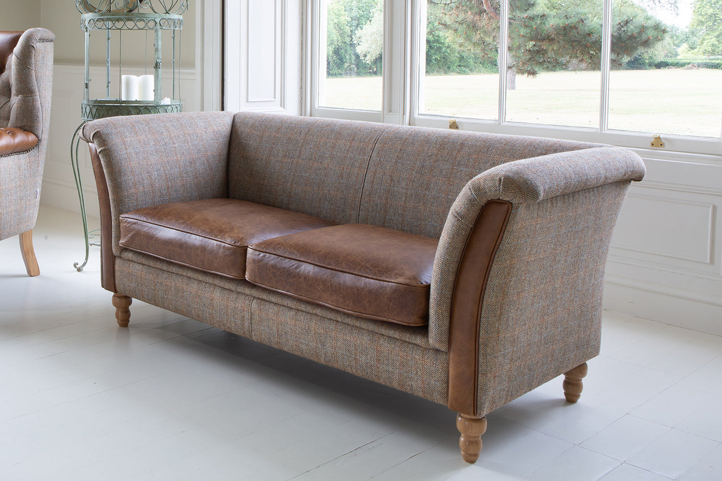 Vintage Sofa Company Granby 2 Seater Plain Back Sofa with Leather seat cushions and arm panels, rolled arms and turned wooden legs
