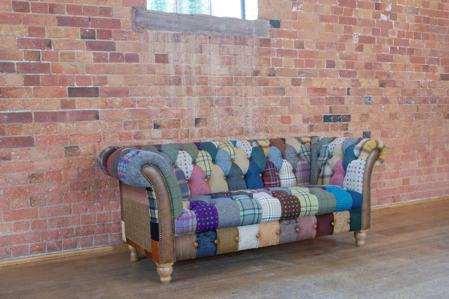 Vintage Sofa Company Harlequin Patchwork 2 Seat Chesterfield Sofa with Patchwork Sides, tan leather arm panels and brass stud detailing, with turned wooden feet