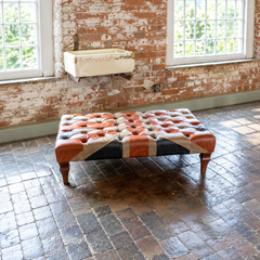 Vintage Sofa Company Large Buttoned Union Jack Leather Banquette Footstool showing the complete product in a room setting