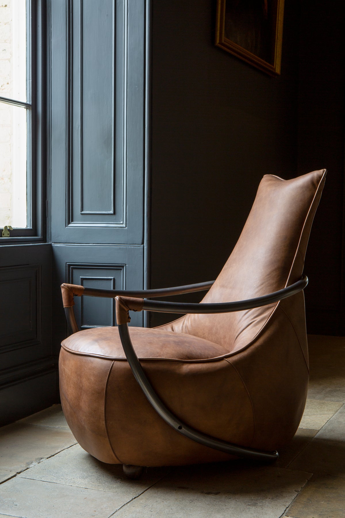 Carlton Furniture Maverick Retro Relax Armchair - side room view showing curved arms and tall brown back