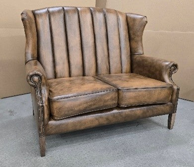 Vintage Sofa Company Clive Fluted Wing 2 Seater in Distressed Antique Leather — lifestyle setting