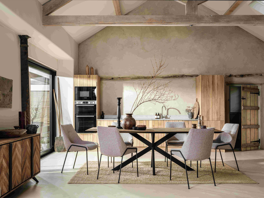 Baker Camden 240cm Rectangular Dining Table features a striking black metal star leg base and a unique chevron inlaid table top that can seat up to 8 people