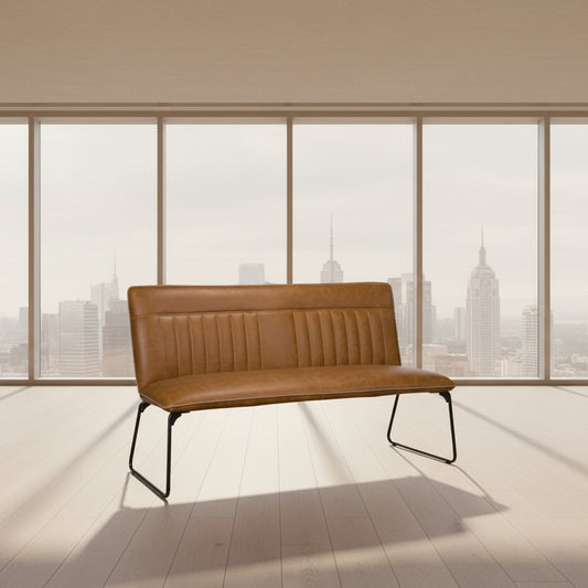 The Baker Cooper faux leather Bench in Tan, has a car seat inspired stitched design and black metal legs 