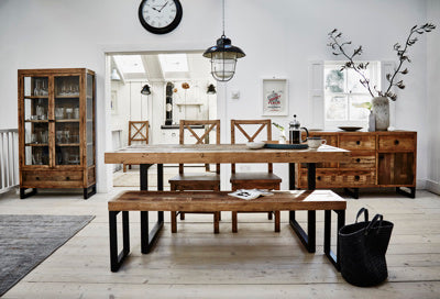 Baker Nixon 155cm Dining Bench constructed from a reclaimed wood bench top and black metal legs and can seat 2-3 people 
