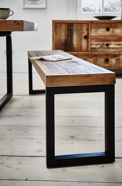 Baker Nixon 155cm 3 seater Dining Bench is made using natural reclaimed woods and powder coated metal legs for a rustic and industrial look 