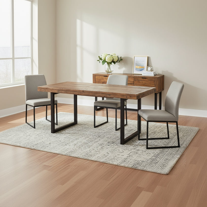 Baker Nixon 180cm-240cm Rectangular Extending Dining Table can seat up to 8 people and is made with reclaimed wood and metal legs. The extension leaf tucks neatly away when not in use.