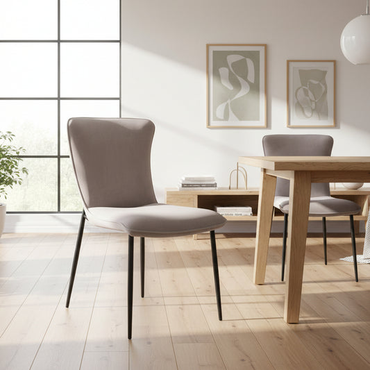 Baker Pair of Ella Dining Chairs fully upholstered in a Grey Poly Velvet cushioned fabric, with black powder coated aluminium legs