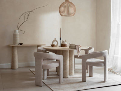 Baker Pair of Georgia Armchairs with a contemporary tripod design, fully upholstered in a beige boucle effect fabric