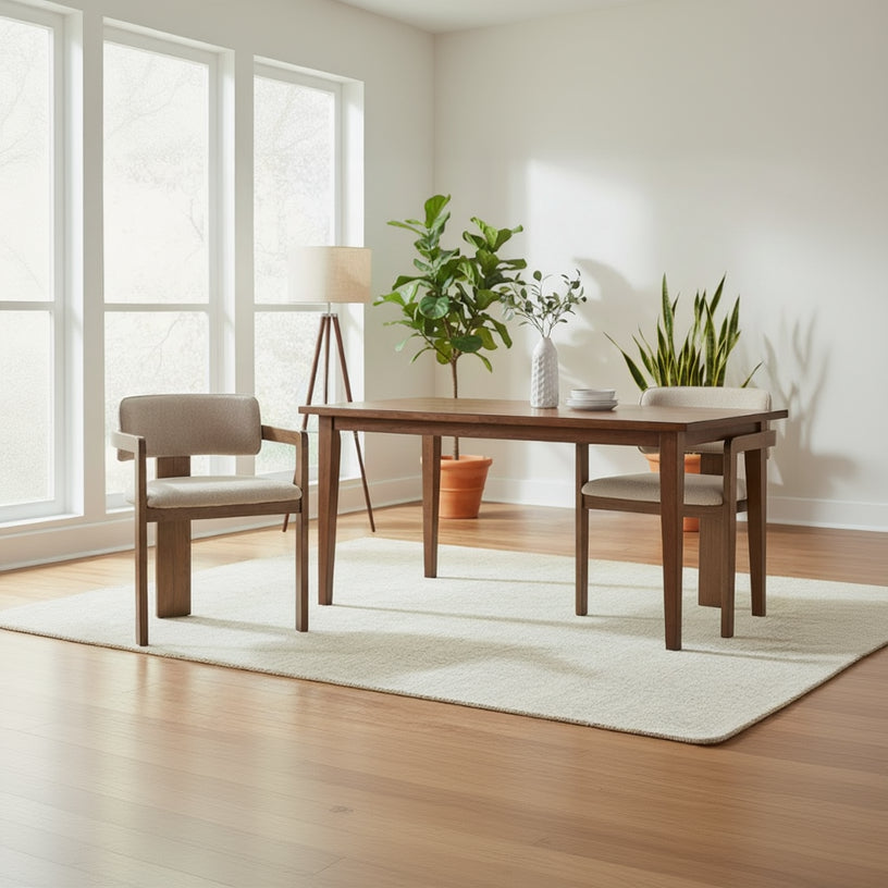 The Baker Pair of Grace Dining Chairs are crafted in a modern contemporary design with dark wooden frames and a natural beige boucle upholstery to the seat and backrest