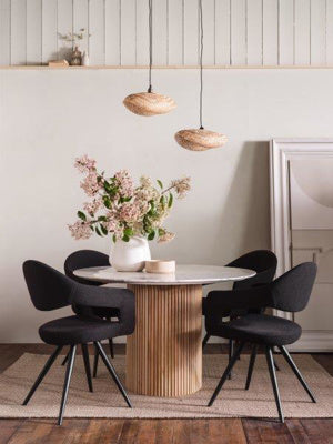 Baker Pair of Jasmine Dining Chairs upholstered in a Black Boucle effect fabric with cut out backrest and black aluminium legs