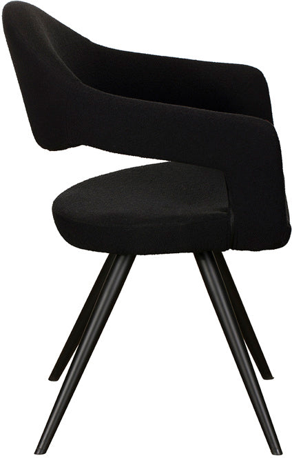 Baker Jasmine Dining Chairs upholstered in a Black Boucle fabric with cut out back and black powder coated aluminium legs