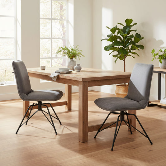 Baker Pair of Lola Dining Chairs in Grey velvet effect cushioned upholstery, featuring a 180 degree swivel seat and black metal legs