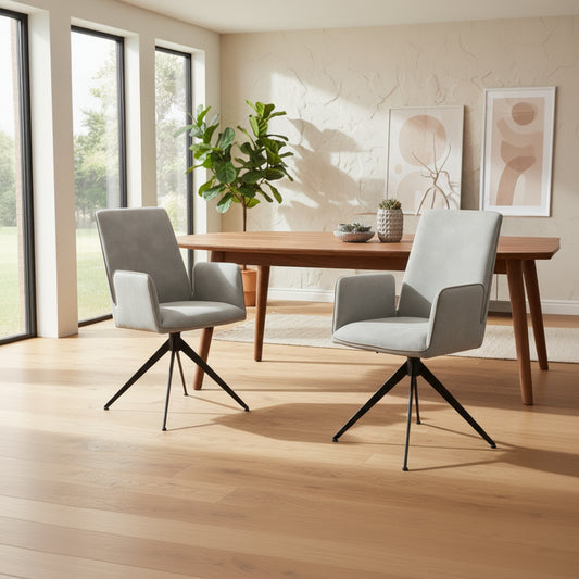 Baker Pair of Rebecca Dining Armchairs in a Misty light grey colour upholstery, with black aluminium legs