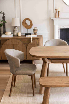Baker Pair of Rowan Dining Chairs in a light brown faux leather fabric with curved backrest and mid wood-effect tapered legs