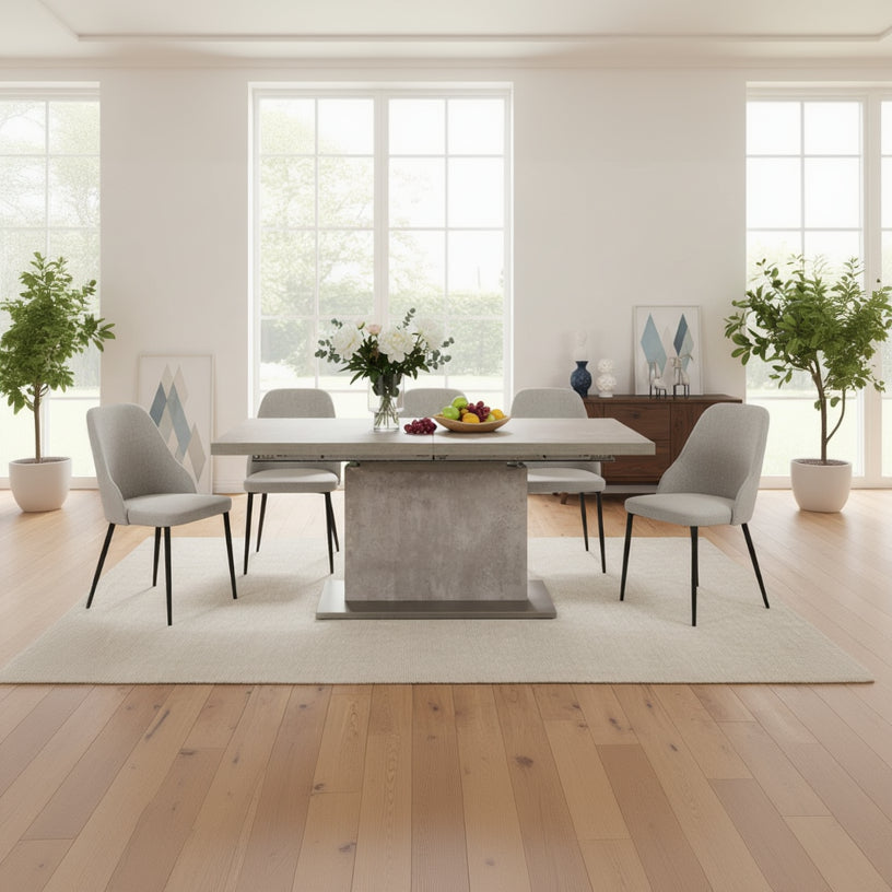Baker Petra 160-220cm Concrete Extending Dining Table features a concrete effect top and brushed stainless steel framework. The neatly hidden central extension piece butterflies out to increase the usable dining space to seat 6-8 people