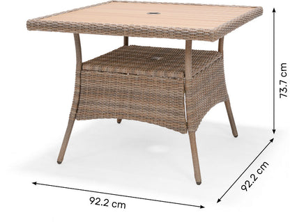 Bermuda 4 Seat Dining Set in Natural Weave rattan features a square table with wood-effect top, a lower shelf and a central parasol hole