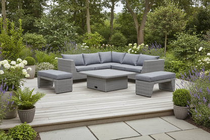 Bermuda Corner Sofa and 2 Bench Dining Set in a Grey Weave rattan with plush grey seat cushions, and a square hi-lo table with sintered stone table top that can be used as a coffee or dining table