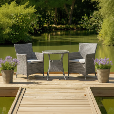 Bermuda Grey Bistro Set in Grey Weave synthetic rattan consists of a round bistro table and 2 dining chairs with seat pads