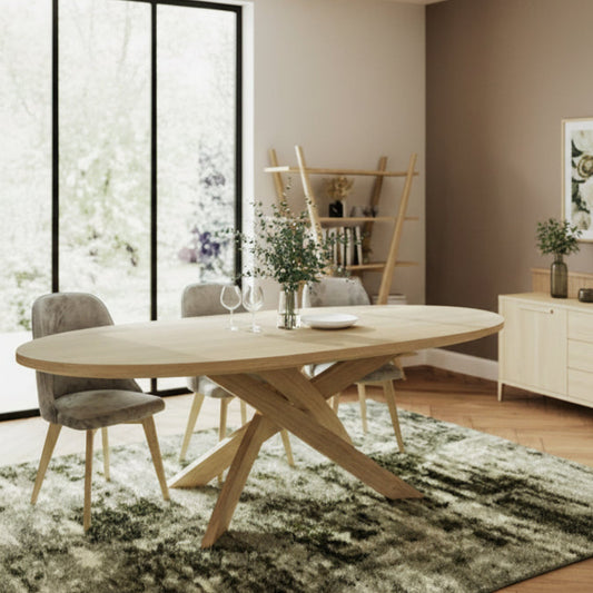 Carlton Furniture Andersson Oval Pedestal Table with Angular Spider Leg Base in natural oak