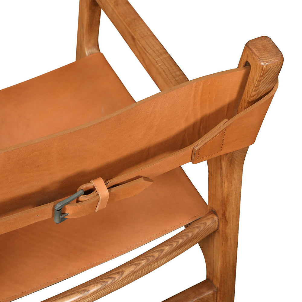 Carlton Furniture Calne Easy Chair features an exposed natural oak wood frame and a tan leather seat and back rest