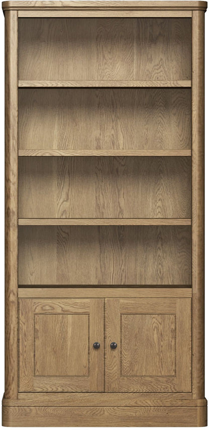 Carlton Furniture Copeland Tall Bookcase crafted from solid natural oak, with 4 shelves and lower cupboard