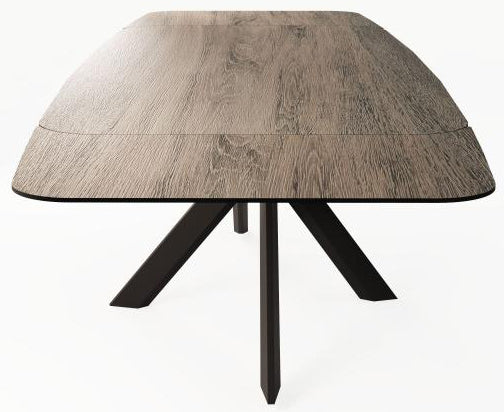 Carlton Furniture Florence Extending Oval Dining Table features a ceramic wood grain effect table top and black metal spider leg base