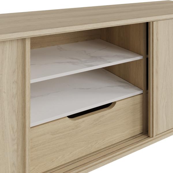 Carlton Furniture Morgan Sideboard features 2 side cupboards, 2 middle shelves in sintered stone and a lower drawer within a Bianco Oak wood frame
