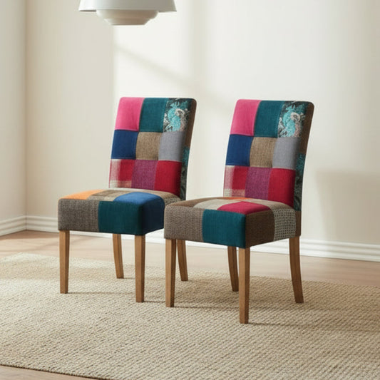 Carlton Furniture Pair of Colin Chairs are upholstered in a vibrant Patchwork upholstery with comfortable padded seating and solid wood legs