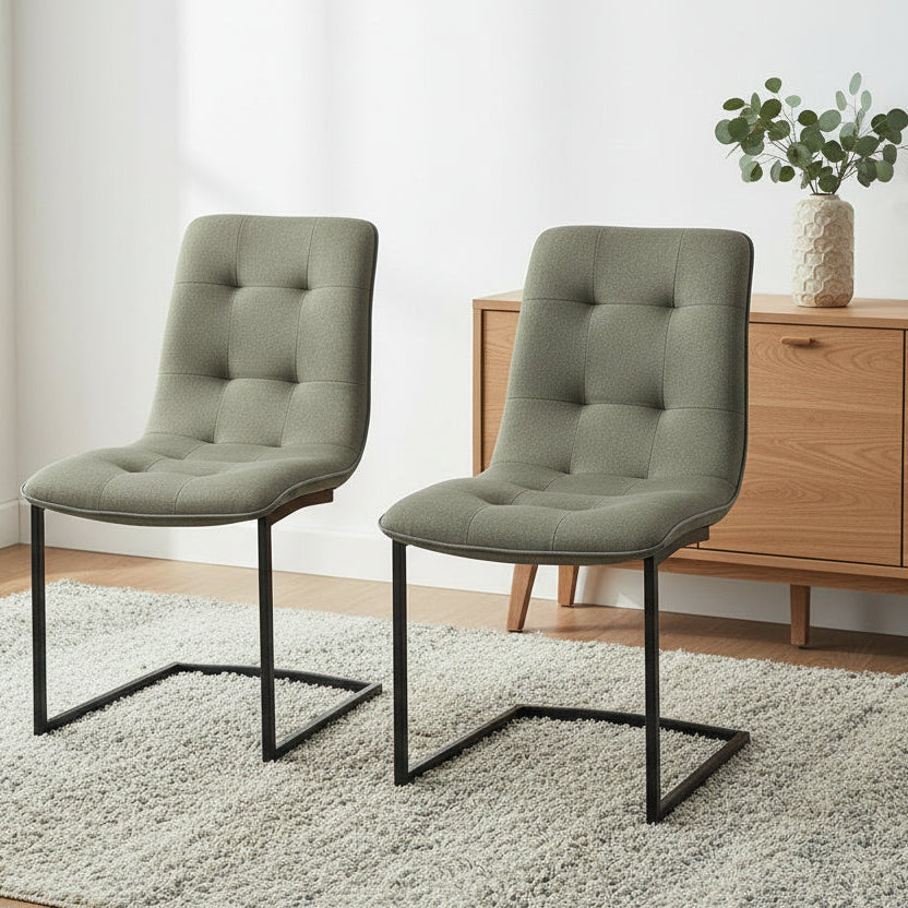 Carlton Furniture Pair of Hampton Dining Chairs Upholstered in Hunter Green Fabric with button tufting detail and black metal cantilever style legs
