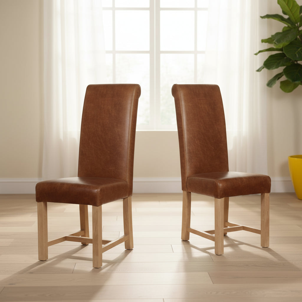 Carlton Furniture Pair of Windermere Rollback Chairs in Cerato Brown Leather, with padded seat and light wooden legs
