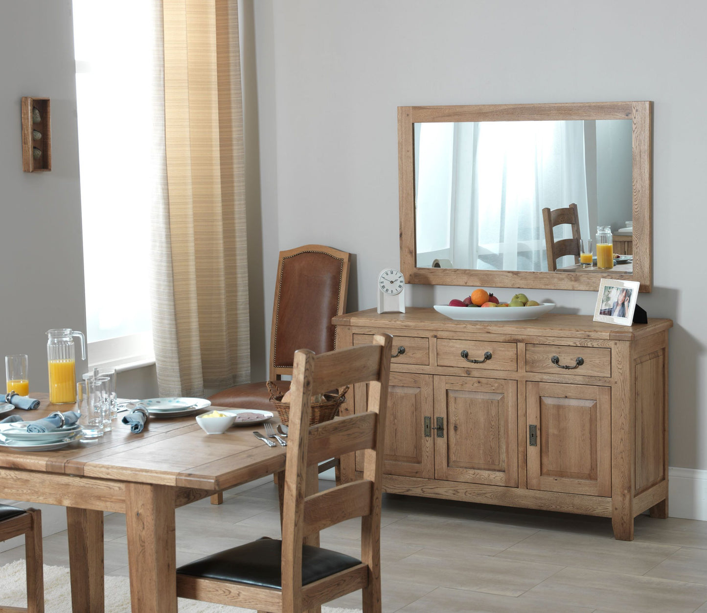 Carlton Furniture Rustic Manor 3 Door 3 Drawer Solid Oak Sideboard provides generous storage options