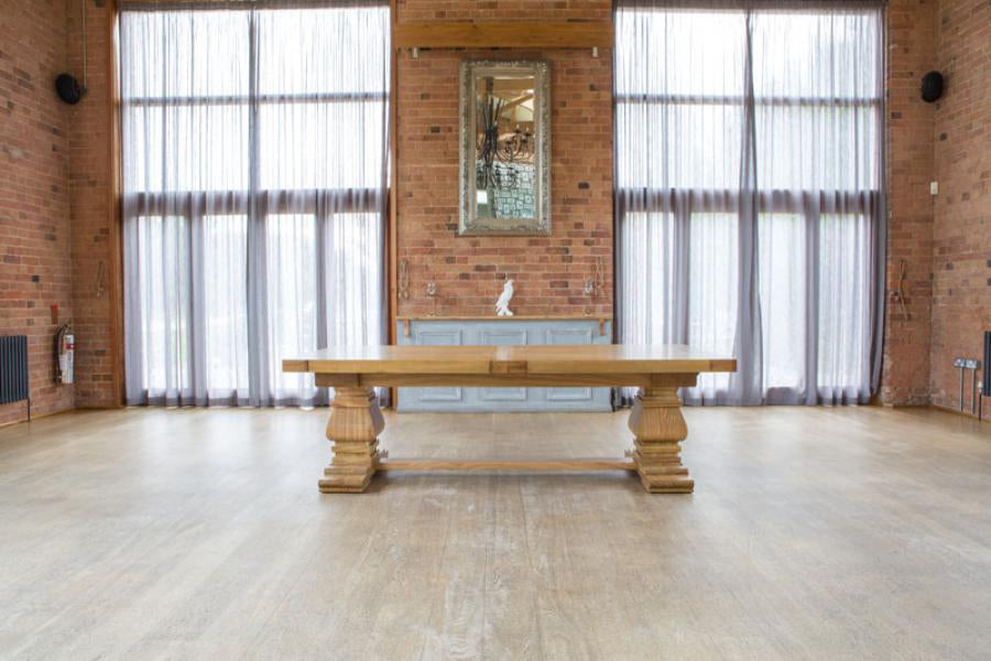 Carlton Furniture Windermere Rustic Monastery Dining Table in Natural Oak, can seat 8-10 or 12-14 people when fully extended