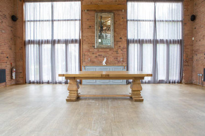 Carlton Furniture Windermere Rustic Monastery Dining Table in Natural Oak, can seat 8-10 or 12-14 people when fully extended