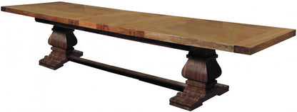 Carlton Furniture Windermere Rustic Monastery Extending Dining Table in chunky natural oak with impressive pedestal legs 