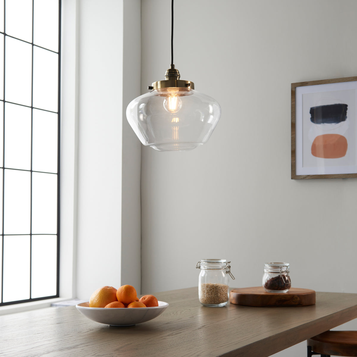 Gallery Direct Lindby Pendant Light Brass / Clear, styled in a room setting