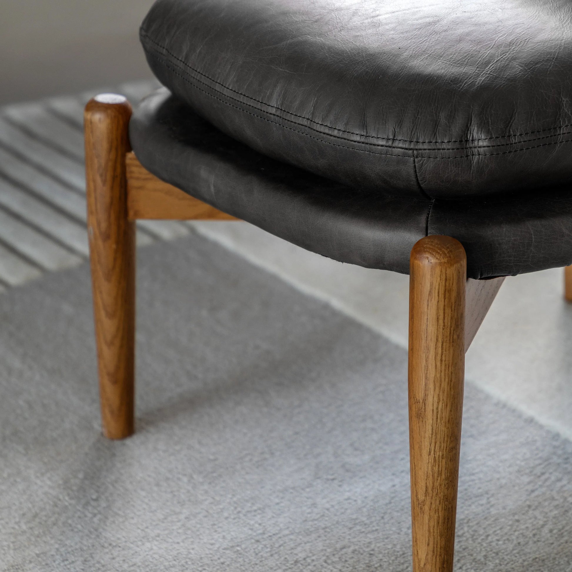 Gallery Direct Datsun Footstool in Antique Ebony Leather