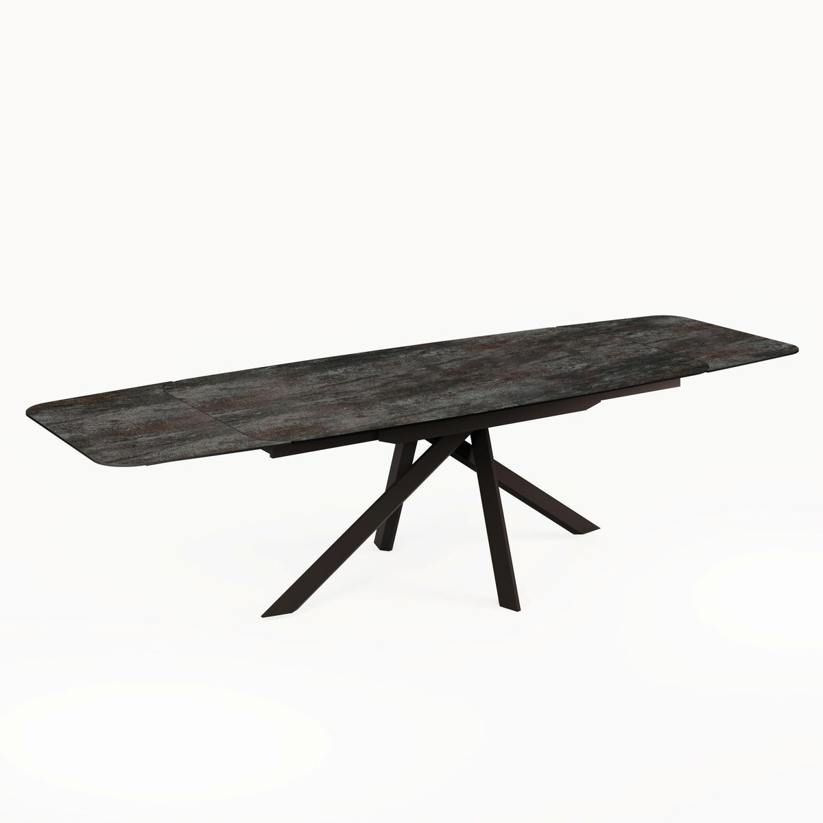 Angled studio view of the Florence Extending Oval Dining Table in Ceramic Volcano, showing its extended dark top and black base.