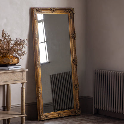 Gallery Direct Abbey Leaner Mirror Gold displayed in a styled interior